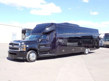 Picture of 2023 Executive Coach Builders Ecoach38 Shuttle Bus