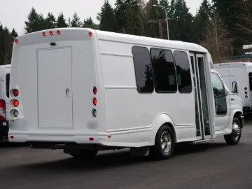 Picture of 2010 Ford Starcraft Starquest Shuttle Bus