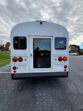 Picture of 2012 Chevrolet Express 4500 Shuttle Bus